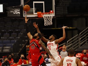 Toronto Raptors forward DeAndre' Bembry makes a basket during his team’s win on Feb. 26, 2021, over the Houston Rockets.