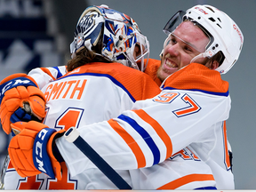 Connor McDavid and Mike Smith