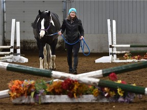 Tricia Dahms, with Marbles at Sandridge Stables, is calling on the government to allow for group riding lessons as they are socially distant in nature, in Strathcona County, Feb. 4, 2021.