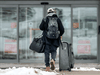 A traveller arrives at the mandatory quarantine Alt Hotel near Toronto’s Pearson Airport during the COVID-19 pandemic, Monday February 22, 2021.