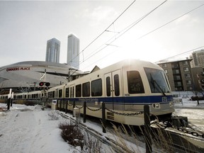 An LRT train on the Metro LRT Line heads north out of Downtown Edmonton on Feb. 10, 2021.