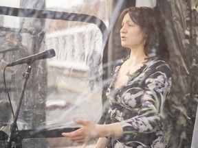 Soprano Whitney Leigh Sloane performs for the Edmonton Opera's Songs of Spring recital outside the Northern Alberta Jubilee Auditorium, Mar. 12, 2021.