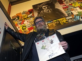 Dave Bacon, a member of the band SNFU, at The Starlite Room in downtown Edmonton, with the band's album If You Swear You'll Catch No Fish, which was released 35 years ago.