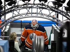 Edmonton Oilers goaltender Mike Smith (41) leaves the ice after warmup prior to facing the Ottawa Senators at Rogers Place in Edmonton on Monday, March 8, 2021.