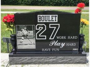 The monument to Humboldt Broncos player Logan Boulet, one of 16 who died in the bus crash in April of 2018. The monument carries symbols for the hockey team and for organ donation.