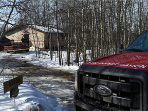 A fire investigator on the scene of an early morning fire that sent two Strathcona County firefighters to hospital at a rural home near Range Road 225A and Township Road 515A in Strathcona County on Wednesday, March 3, 2021.
