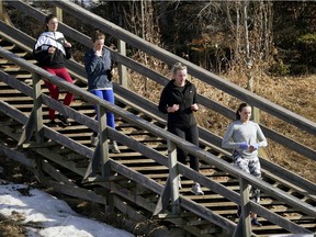 Four women exercise on a staircase in Edmonton's river valley on Thursday March 4, 2021.