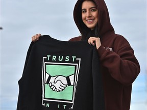 Brianne Helfrich has started her own clothing line and is putting a portion of her sales for her first collection, like the hoodie she's wearing, towards supporting mental health organizations, in Sherwood Park, March 12, 2021. Ed Kaiser/Postmedia