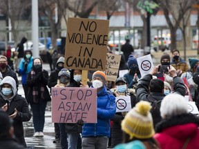 People take part in the bridges against hate march to support BIPOC communities against racism and violence on Saturday, March 27, 2021, in Edmonton.