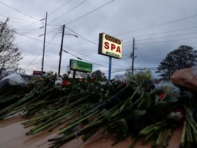 A makeshift memorial sits outside of Gold Spa following the deadly shootings in Atlanta, Georgia, U.S. March 18, 2021. REUTERS/Shannon Stapleton ORG XMIT: PPP-SHN-103