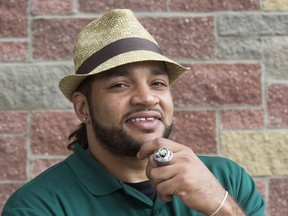 Calvin McCarty shows off his Grey Cup ring in Edmonton on May 27, 2016. Members of the Edmonton Football Team received their Grey Cup rings during a private ceremony at the Chateau Nova Yellowhead Hotel, 13920 Yellowhead Trail.