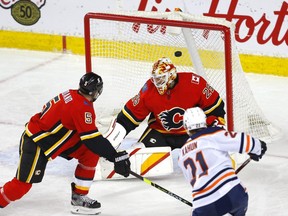 Calgary Flames goalie Jacob Markstrom is scored on by Edmonton Oilers Dominik Kahun in second period NHL action at the Scotiabank Saddledome in Calgary on Wednesday, March 17, 2021.
