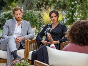 Prince Harry and Meghan, Duchess of Sussex, are interviewed by Oprah Winfrey in this undated handout photo.