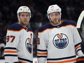 Connor McDavid (97) and Leon Draisaitl of the Edmonton Oilers.