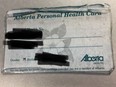 An Alberta Personal Health Card in its natural state: Frayed, battered and suffering from an ad hoc lamination attempt.
