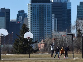 It was a great day for a game of pickup basketball at Forest Hieghts Park with temperatures reaching around the 15 C mark in Edmonton, March 18, 2021. Ed Kaiser/Postmedia