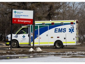 File: A ambulance arrives at the Redwater Health Centre, in Redwater Alberta, Friday March 12, 2021. Photo by David Bloom