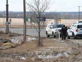 Police remain on scene of a possible sudden death along Hwy 16A between Spruce Grove and Stony Plain, Monday March 29, 2021.