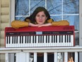 Soul singer and songwriter Ann Vriend on her front porch in McCauley, which she used to stage 26 neighbourhood
concerts last year.