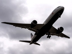 An Air Canada flight prepares to land at Toronto Pearson International Airport during the COVID-19 pandemic, Tuesday April 20, 2021.