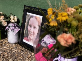 A memorial of flowers, special items and photographs is growing in memory of Jenny Winkler, who was murdered in a stabbing Monday at Christ The King High School in Leduc, at the Town of Millet Administration Office on Wednesday, March 17, 2021.