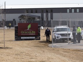 A fence has gone up around GraceLife Church and security is on scene to keep church members away on Wednesday, April 7, 2021 .