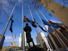 Flags fly at half mast at Edmonton City Hall to mark the death of Prince Philip, the Duke of Edinburgh and husband of Queen Elizabeth II, on Friday, April 9, 2021.