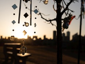 Wind chimes and crystals sway in the breeze as the sun sets at Gallagher Park in Edmonton, on Tuesday, April 13, 2021. Photo by Ian Kucerak