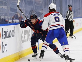 Edmonton Oilers forward Kailer Yamamoto (56) tries to get by Montreal Canadiens defensemen Ben Chairot (8) long the boards during the third period at Rogers Place.