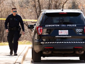 Edmonton Police Service officers blocked off Alex Taylor Road while conducting an investigation in Edmonton, on Sunday, April 25, 2021. Photo by Ian Kucerak