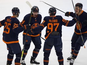 Edmonton Oilers Ethan Bear (74) celebrates his goal with teammates against the Montreal Canadiens during third period NHL action on Monday, April 19, 2021 in Edmonton.