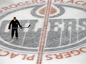 Edmonton Oilers head coach Dave Tippett skates at Rogers Place in Edmonton during a team practice Feb. 22, 2021.