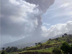This April 9, 2021, image courtesy of The University of the West Indies (UWI) Seismic Research Centre shows the eruption of La Soufriere Volcano in Saint Vincent. - La Soufriere erupted Friday for the first time in 40 years on the Caribbean island of Saint Vincent, prompting thousands of people to evacuate, seismologists said. The blast from the volcano, sent plumes of ash 20,000 feet (6,000 meters) into the air, the local emergency management agency said. The eruption was confirmed by the UWI center. (Photo by - / various sources / AFP) / RESTRICTED TO EDITORIAL USE - MANDATORY CREDIT "AFP PHOTO / Courtesy of The UWI Seismic Research Centre" - NO MARKETING - NO ADVERTISING CAMPAIGNS - DISTRIBUTED AS A SERVICE TO CLIENTS