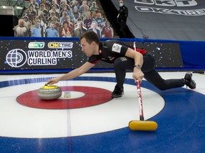 Team Canada skip Brendan Bottcher delivers his stone in team Canada's final practice before taking on rival Scotland in game one, April 2, 2021.