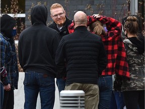 Pastor James Coates, centre, greeted by a group of supporters after being released from the Edmonton Remand Centre on March 22, 2021.