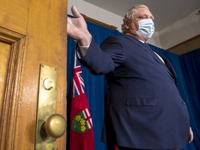 Ontario Premier Doug Ford arrives to make an announcement during the daily briefing at Queen's Park in Toronto on Thursday April 1, 2021. An Ontario-wide "shutdown'' will be put in place to combat an "alarming'' surge in COVID-19 infections, Ford said Thursday as intensive care admissions related to the virus surpassed those of the second wave of the pandemic.