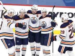 Edmonton Oilers defenseman Tyson Barrie (22) celebrates his second period goal against the Winnipeg Jets at Bell MTS Place on April 17, 2021.