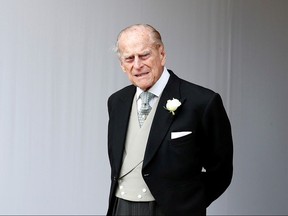 Britain's Prince Philip waits for the bridal procession following the wedding of Princess Eugenie of York and Jack Brooksbank in St George's Chapel, Windsor Castle, near London, Britain October 12, 2018.