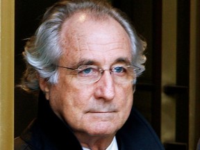 FILE PHOTO: Bernard Madoff exits the Manhattan federal court house in New York in this January 14, 2009 file photo.   REUTERS/Brendan McDermid/File Photo/File Photo ORG XMIT: FW1
