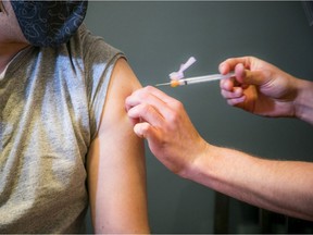 Getting a shot at Jabapalooza, a vaccine clinic set up in the Glebe for one day last month.