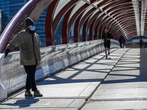 Calgarians enjoy the warm weather in Calgary on Friday, April 16, 2021. The temperature is set to hit a high of 18 C.