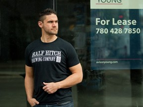 Half Hitch Brewing Company CEO and co-founder Kyle Heier poses for a photo outside a future location of the beer and pizza chain at 10404 82 Ave., in Edmonton on Friday May 28, 2021. Heier is looking to expand his business into Edmonton but has hit a snag with the city's approval process.