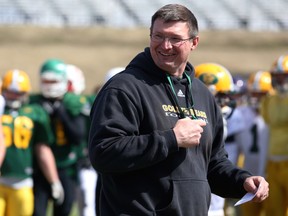 University of Alberta Golden Bears football head coach Chris Morris has a laugh during the team's annual spring training camp at Foote Field in Edmonton on April 27, 2014.