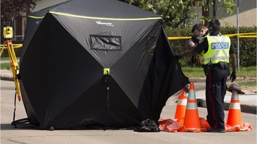 Police investigate a fatal pedestrian collision at 129 Ave. and 126 Street on Friday, May 21, 2021 in Edmonton.Greg Southam-Postmedia