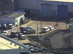 In this photo provided by KGO-TV, emergency personnel respond to the scene of a shooting at a rail yard on Wednesday, May 26, 2021 in San Jose, Calif.