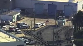 In this photo provided by KGO-TV, emergency personnel respond to the scene of a shooting at a rail yard on Wednesday, May 26, 2021 in San Jose, Calif.