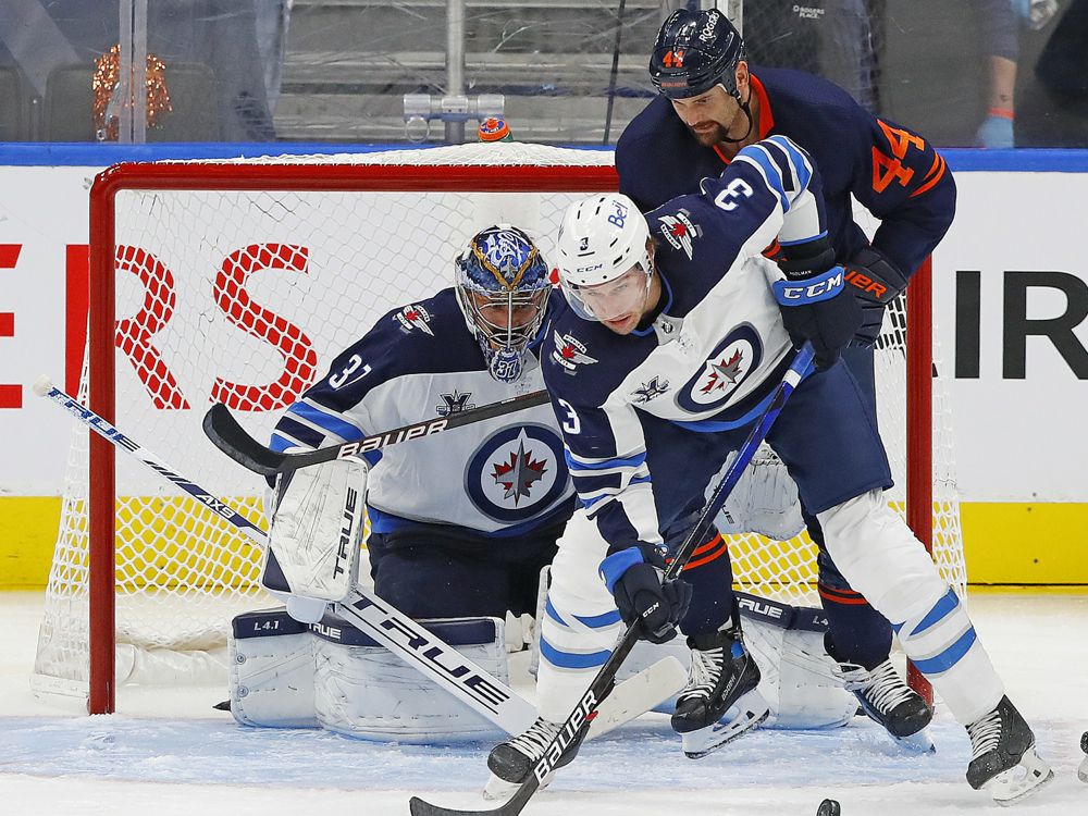 Hellebuyck, Pionk, Connor lead Jets to 2-1 win over Oilers - The