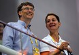 Microsoft Corp co-founder Bill Gates (L) and his wife Melinda Gates watch the swimming events at the National Aquatics Center during the Beijing 2008 Olympic Games, in Beijing, China August 10, 2008.
