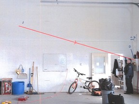 A composite photo showing the trajectory of a bullet Destry Sayine fired at RCMP officers during a 2018 standoff on his rural Alberta property. Sayine was sentence to 6 1/2 years in prison on May 28, 2021.
