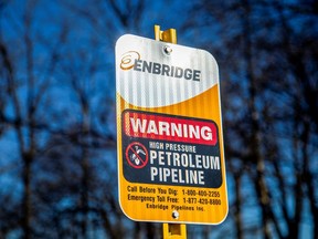 A signpost marks the presence of Enbridge's Line 5 pipeline, which Michigan Governor Gretchen Whitmer ordered shut down in May 2021, in Sarnia, Ont.